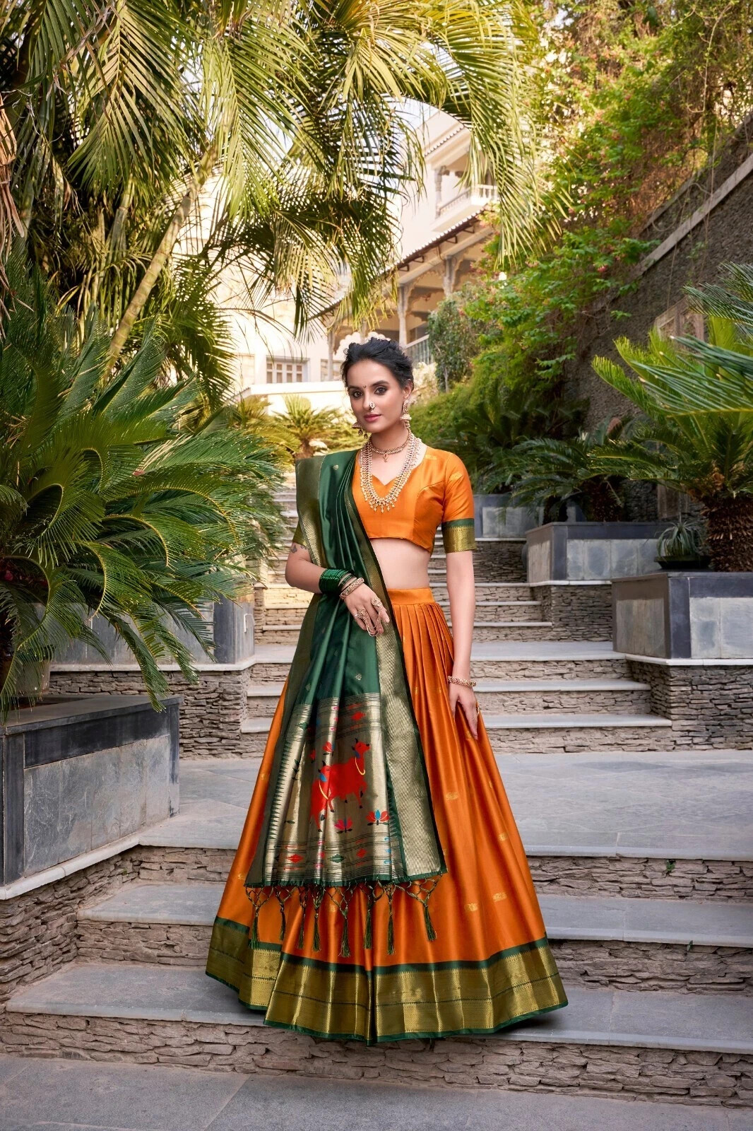 Indian Style Jacquard Silk Orange Lehenga Choli And Dupatta For Reception