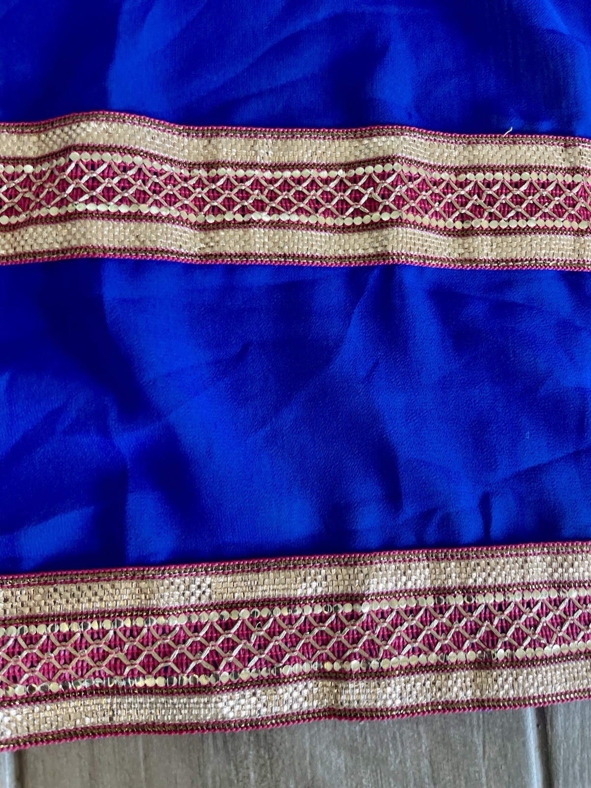 Royal blue duppatta features a gold border and a red-and-gold striped. 42×107