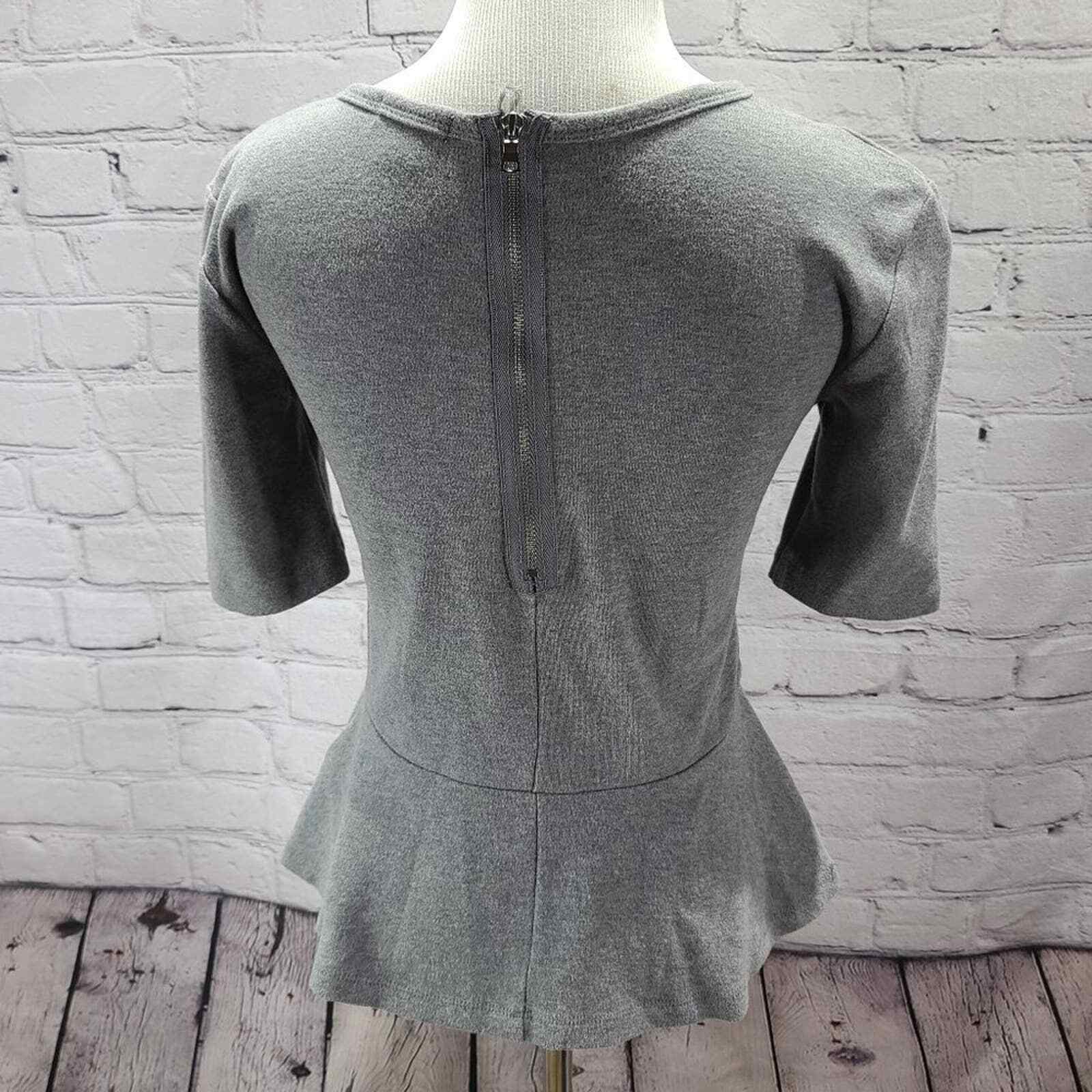 Gap Gray fitted blouse with flare bottom hem