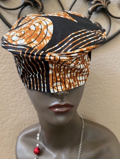 Kufi Black w/Brown Cotton Hat Designs w/elastic back. 18 -20″ Circumference.