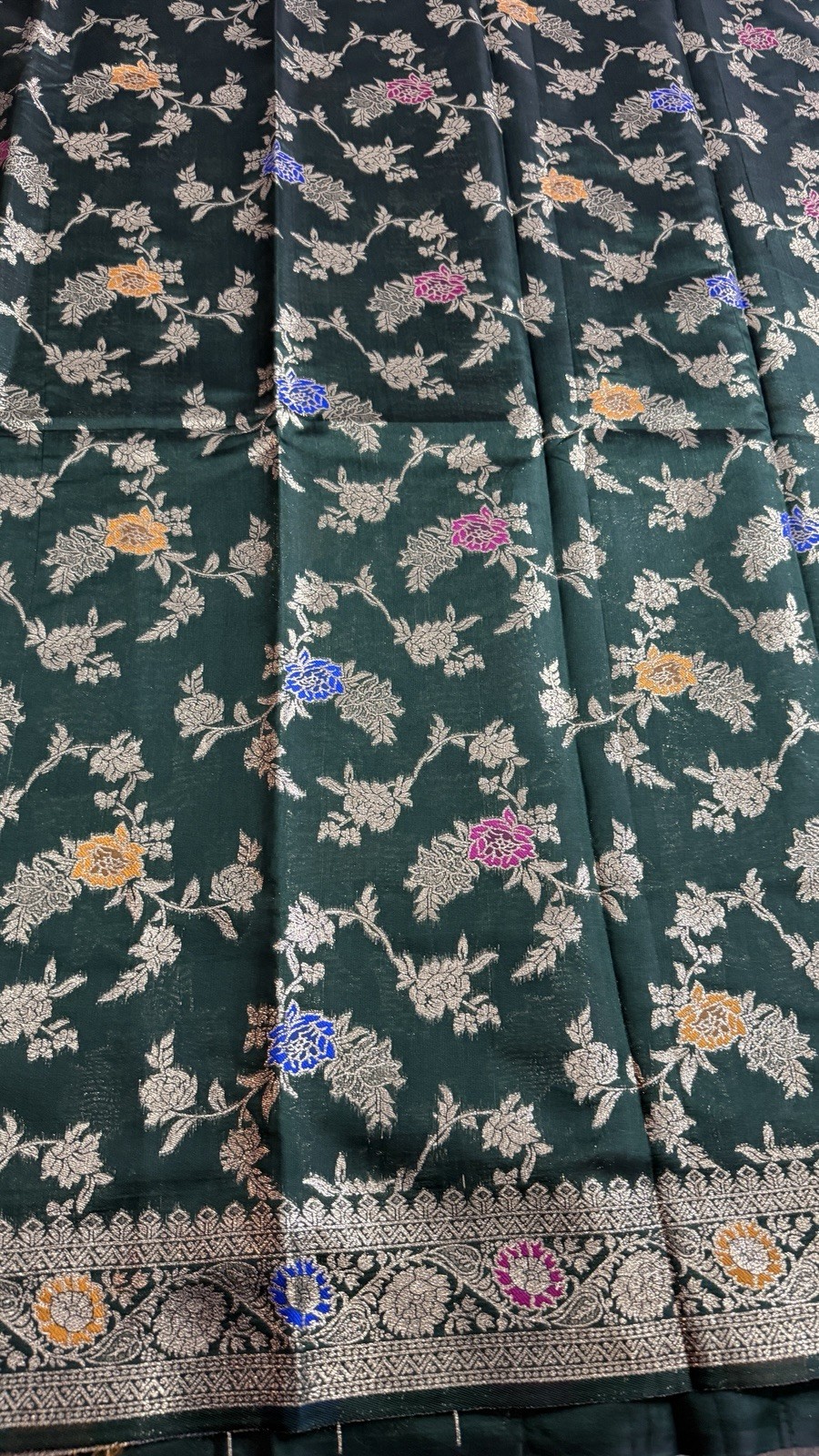 Dark Green Georgette Silk Saree with Floral Zari Weaving
