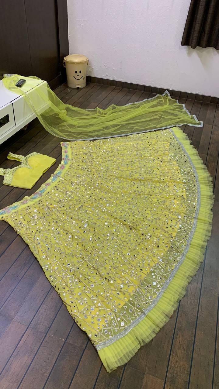 Function Wear Yellow Georgette Lehenga Choli With Net Dupatta For Women