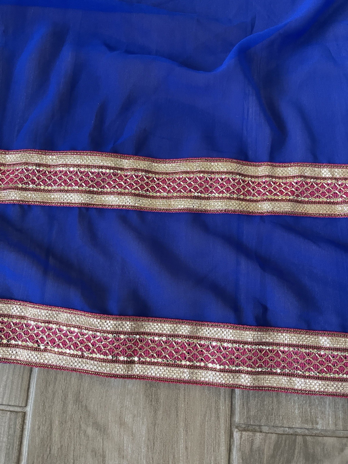 Royal blue duppatta features a gold border and a red-and-gold striped. 42×107
