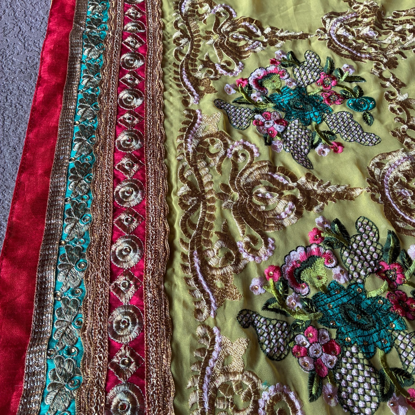 Yellow and Green Chiffon Sari with Pink and Teal Embroidered Flowers