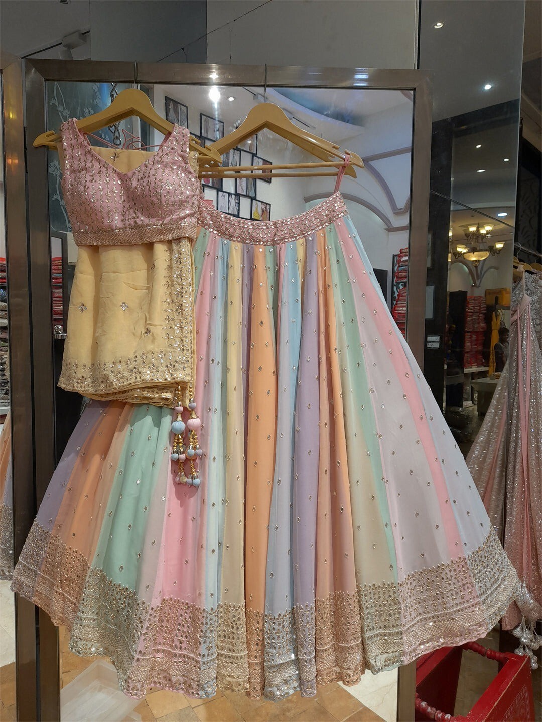 Pastel colored designer marriage lehnga choli with sequin embroidery work