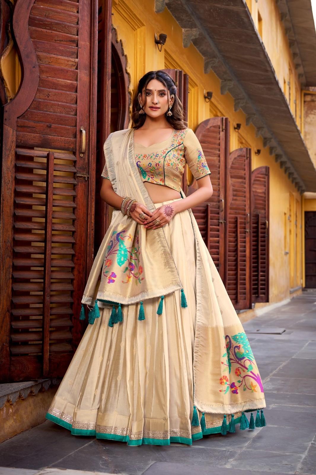 Traditional art woven in gold Paithani-style lehenga is pure festive perfection