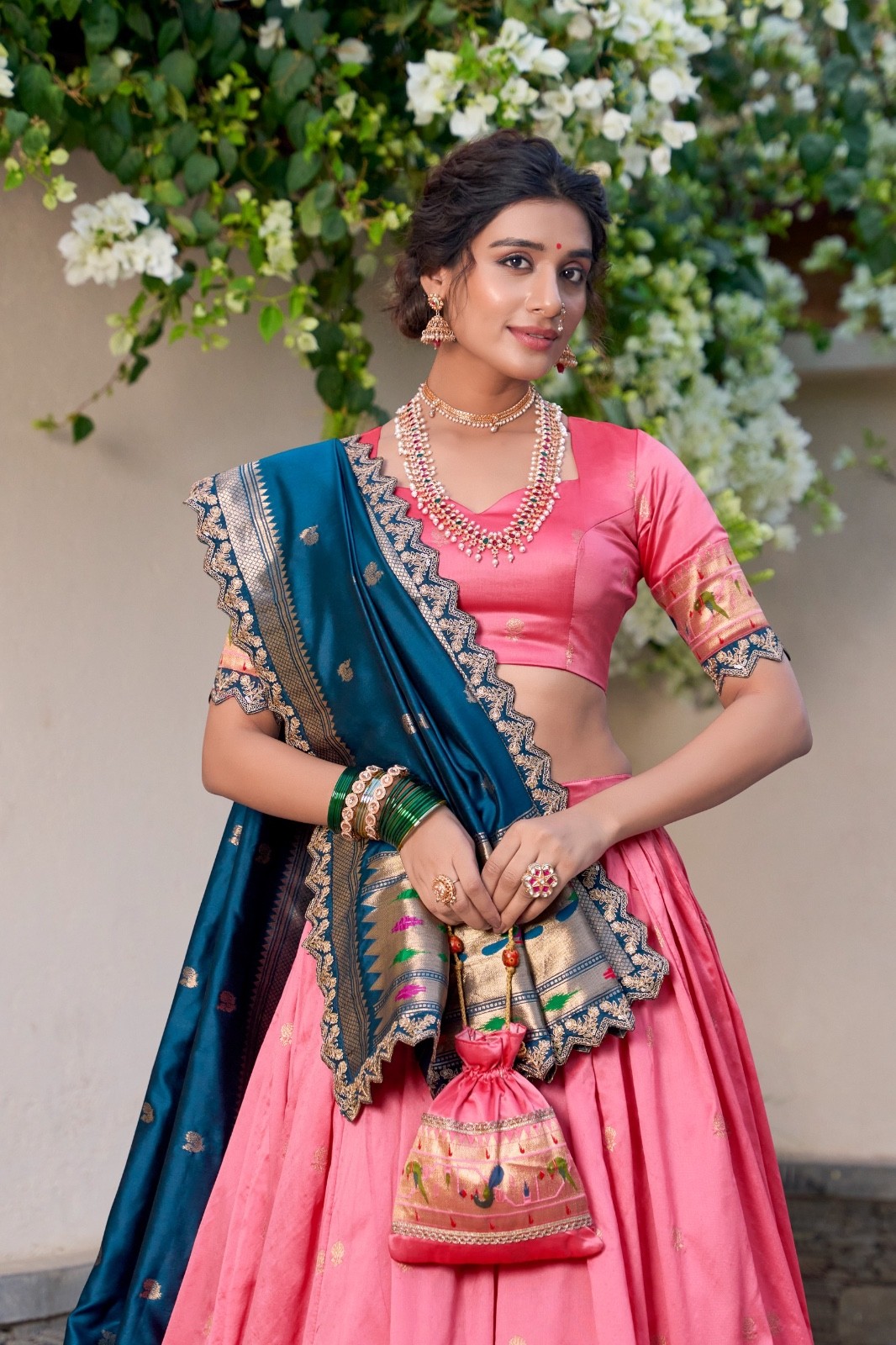 Traditional art woven in gold Paithani-style lehenga is pure festive perfection