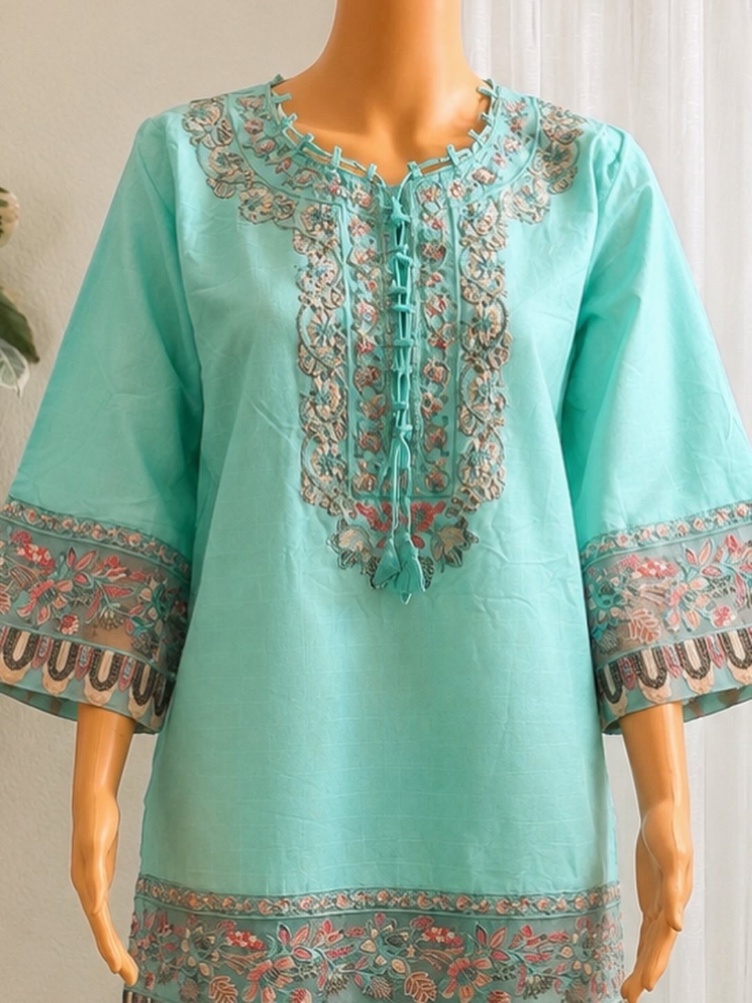 Mint elegance with delicate embroidery