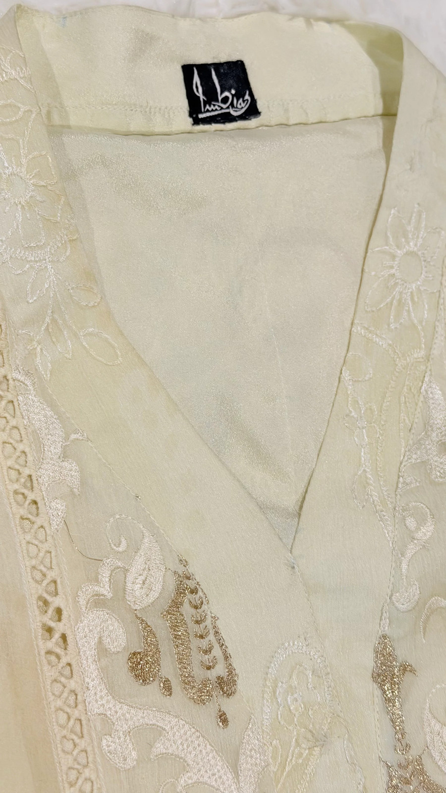Imbias Off-White Chiffon Shirt with Embroidery and Self-Print background in