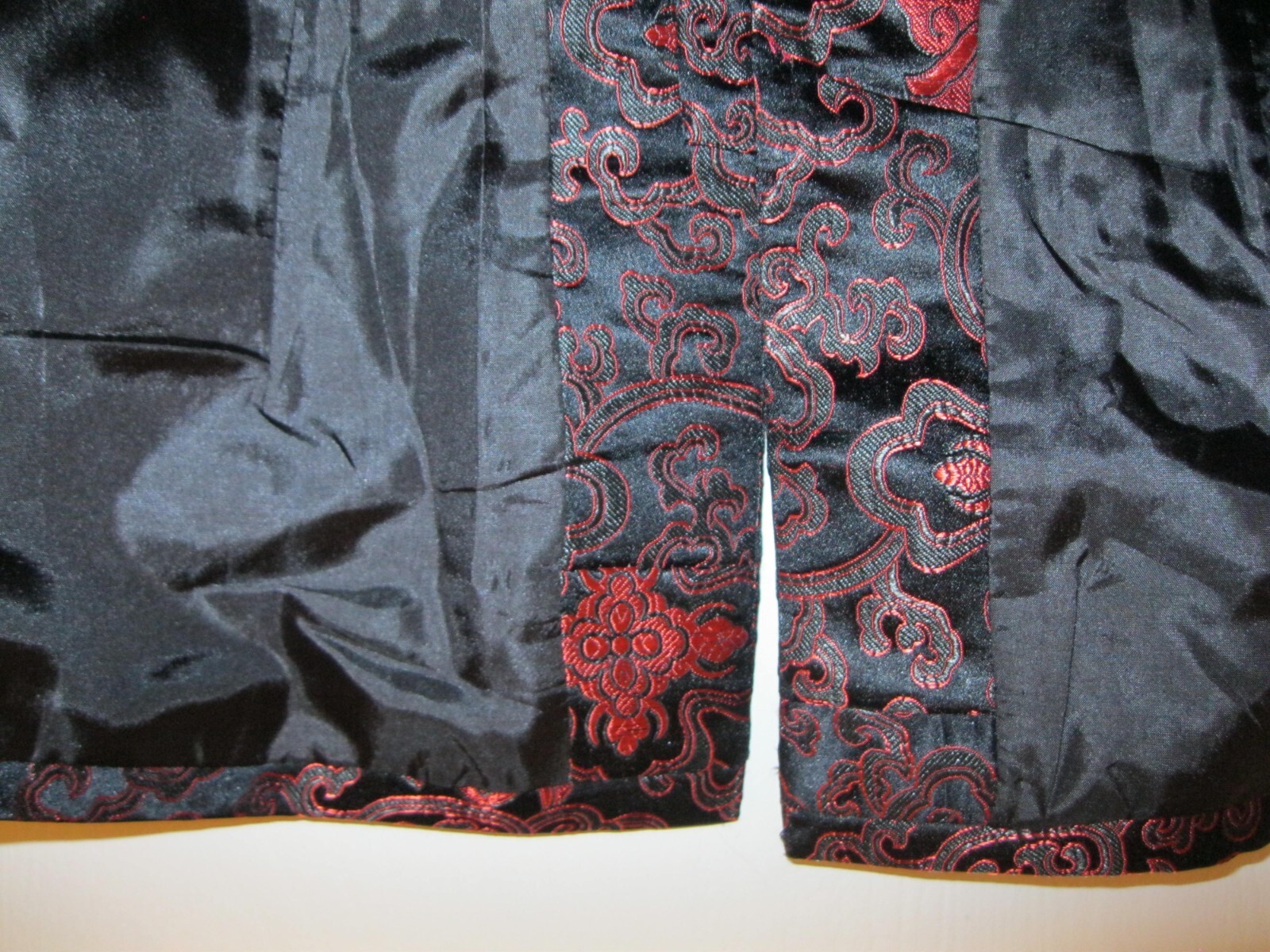 CHINESE, BLACK JACKET W/ RED COLORED DESIGNS, SZ. S., NEW.