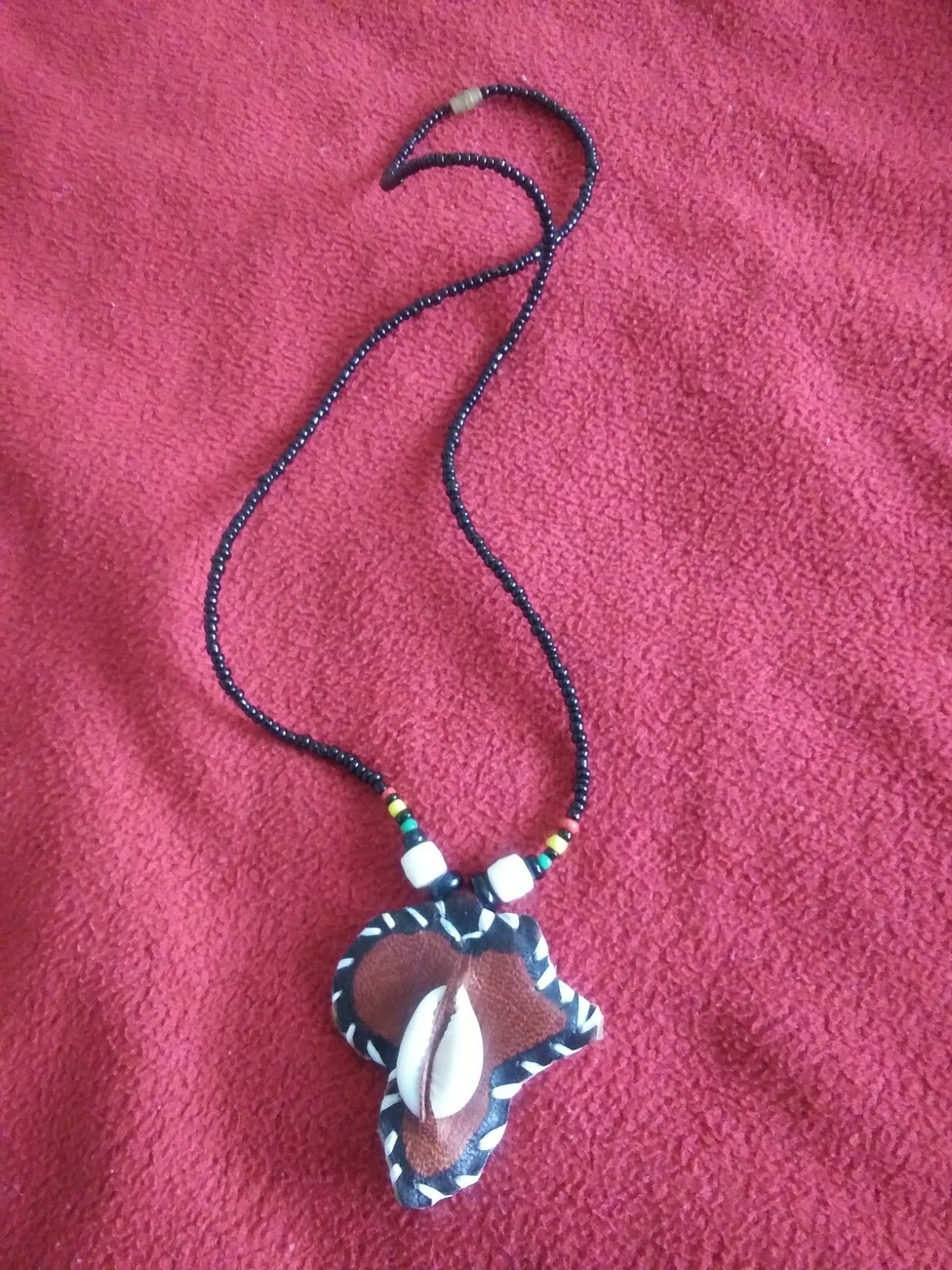 linike made in ghana hand made beads & leather necklace.Cowry pendant 