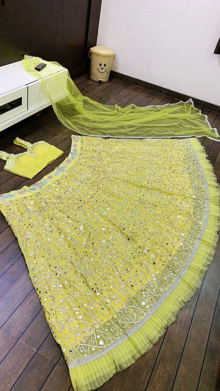 Function Wear Yellow Georgette Lehenga Choli With Net Dupatta For Women