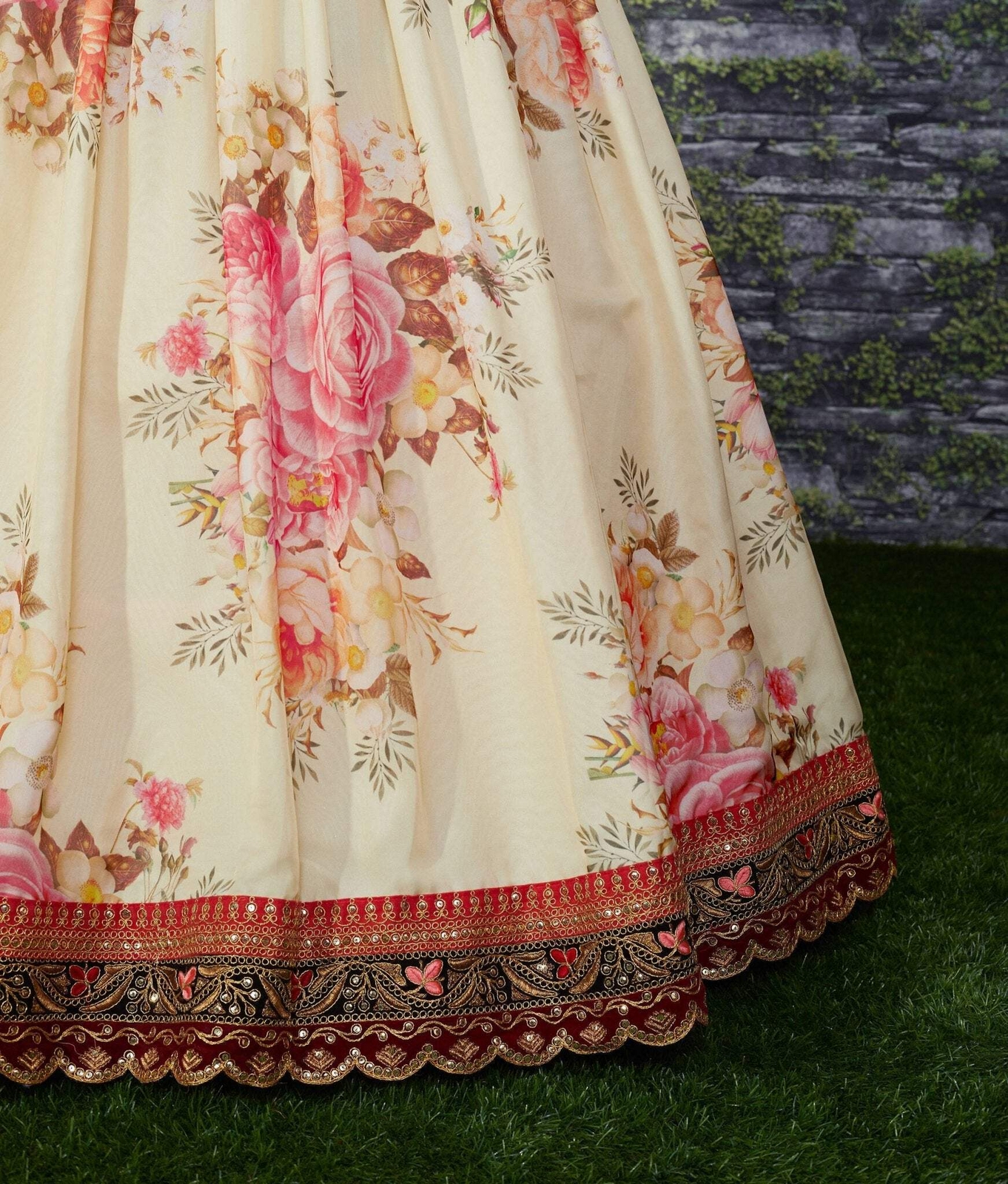White choli being silk in peach color and is beautifully decorated with sequins,