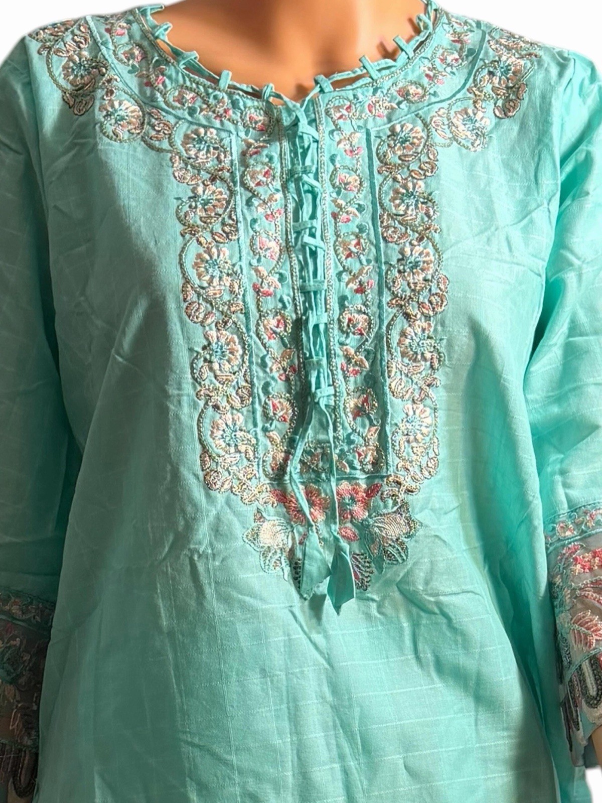 Mint elegance with delicate embroidery