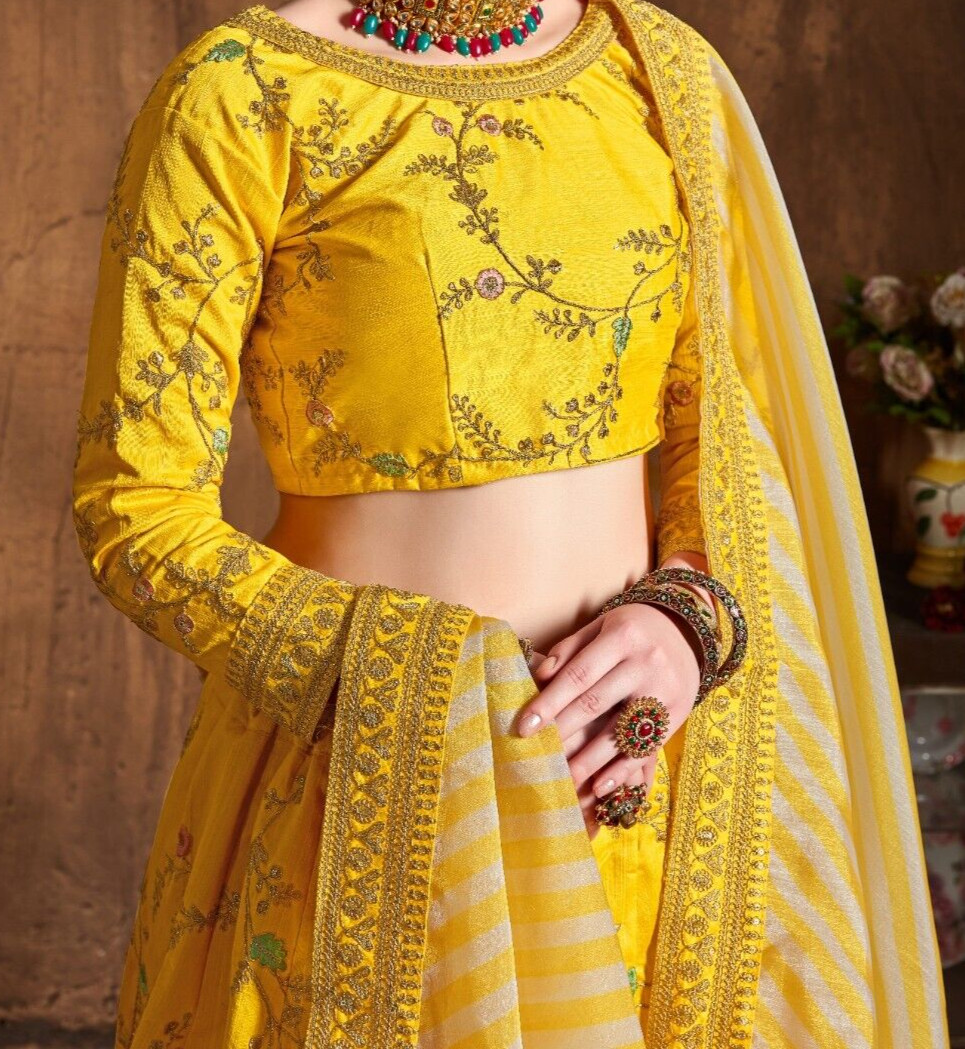Yellow Color Mulberry Silk Lehenga Choli With Organza Dupatta For Reception Wear