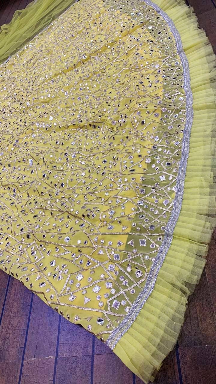 Function Wear Yellow Georgette Lehenga Choli With Net Dupatta For Women