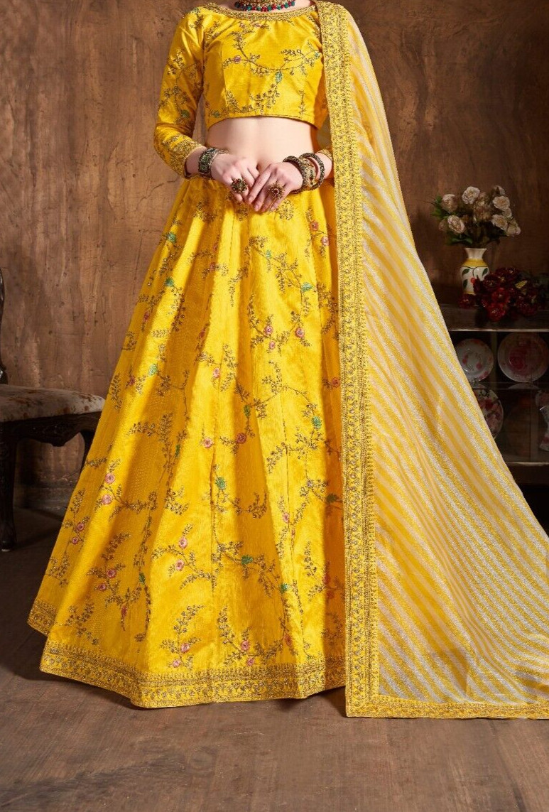Yellow Color Mulberry Silk Lehenga Choli With Organza Dupatta For Reception Wear