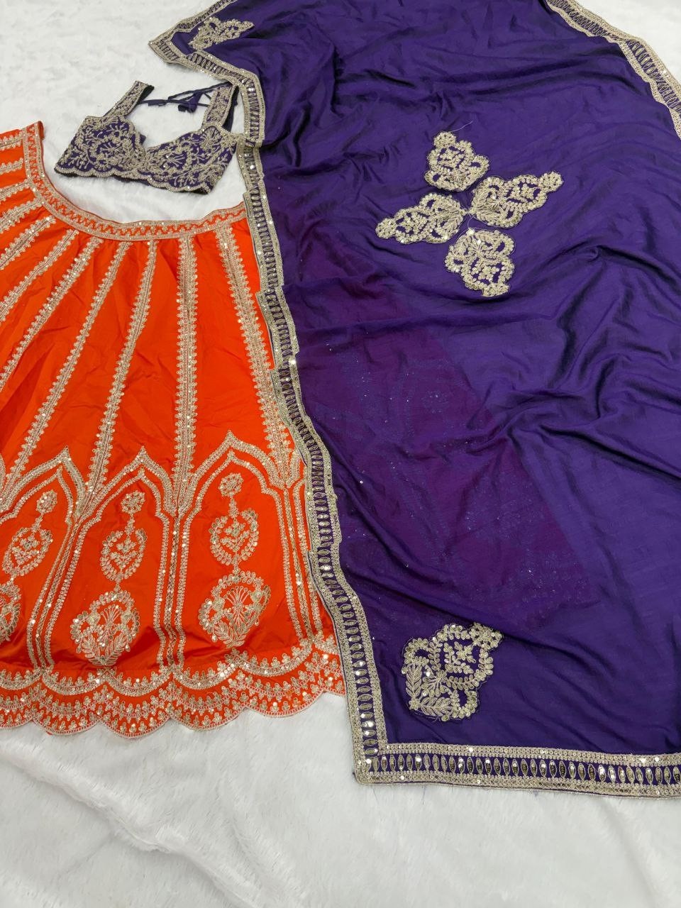Stunning Look Silk Orange Lehenga Choli With Blue Dupatta For Reception Wear