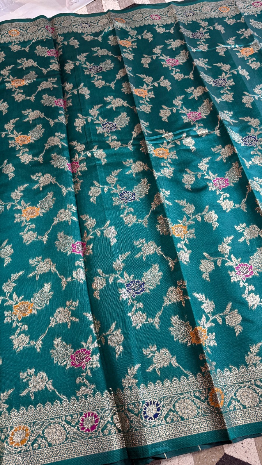 Luxury Teal Georgette Silk Saree with Intricate Floral Zari Weaving
