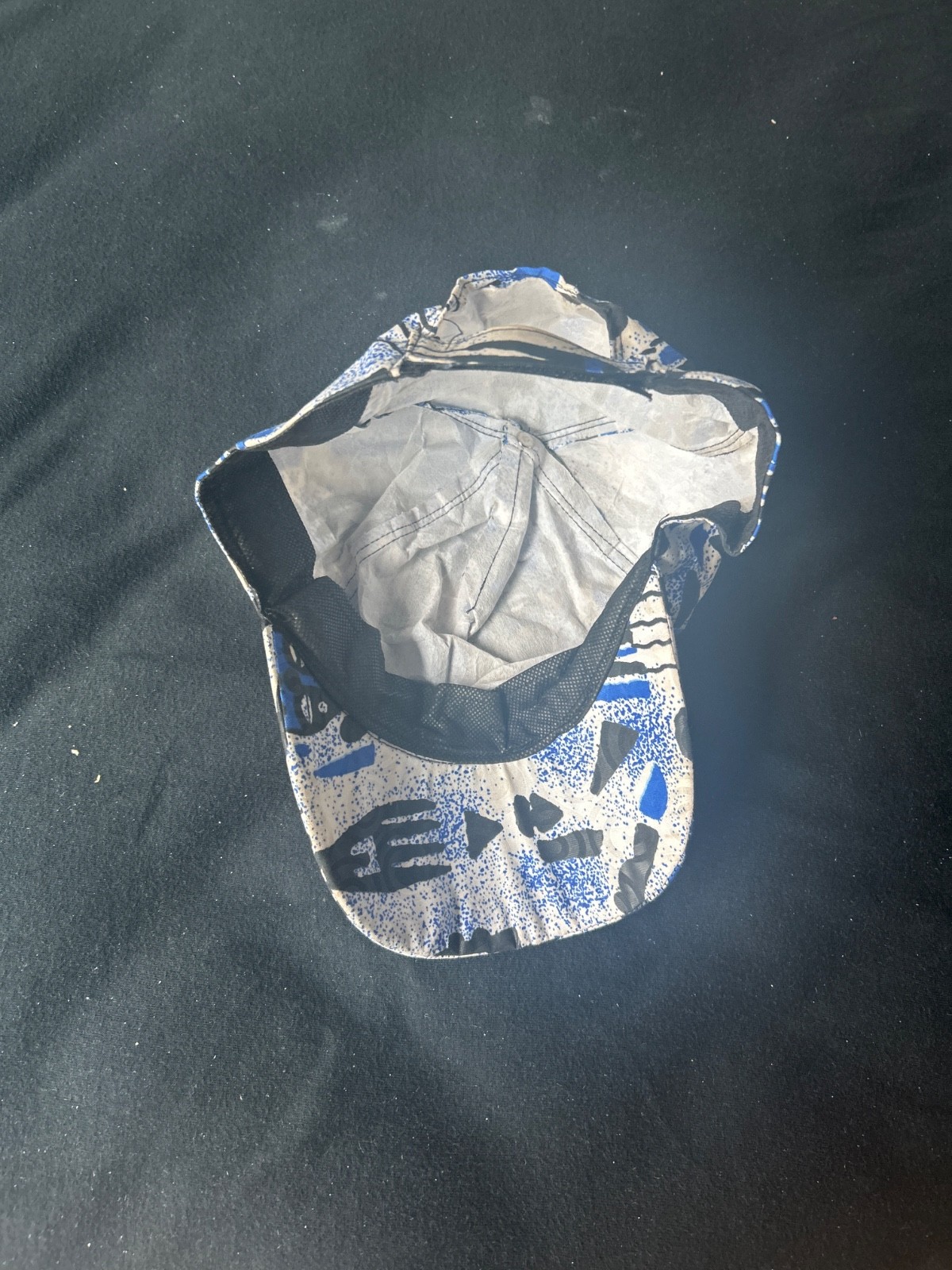 Blue, white, black African cap