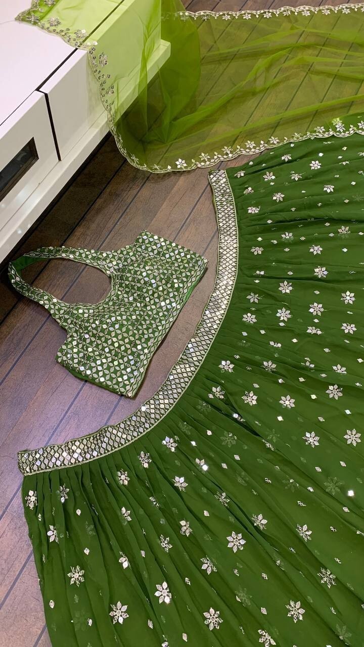 Beautiful Desgner Parrot Green Georgette Lehenga Choli And Dupatta For Function