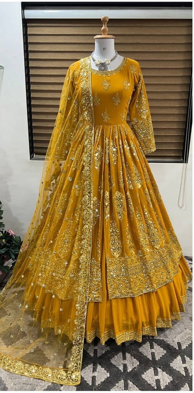 Wedding Wear Mustard Yellow Faux Georgette Top Lehenga With Dupatta For Women
