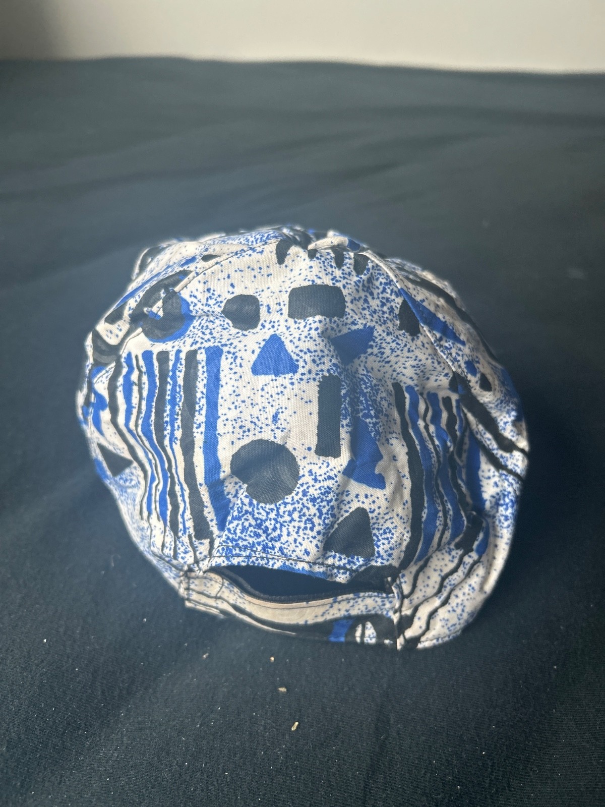 Blue, white, black African cap
