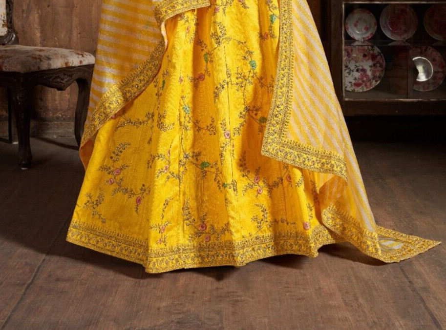 Yellow Color Mulberry Silk Lehenga Choli With Organza Dupatta For Reception Wear