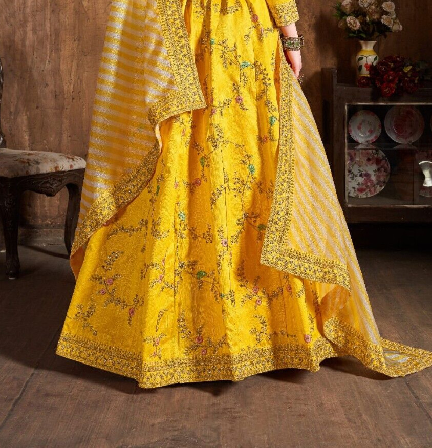 Yellow Color Mulberry Silk Lehenga Choli With Organza Dupatta For Reception Wear
