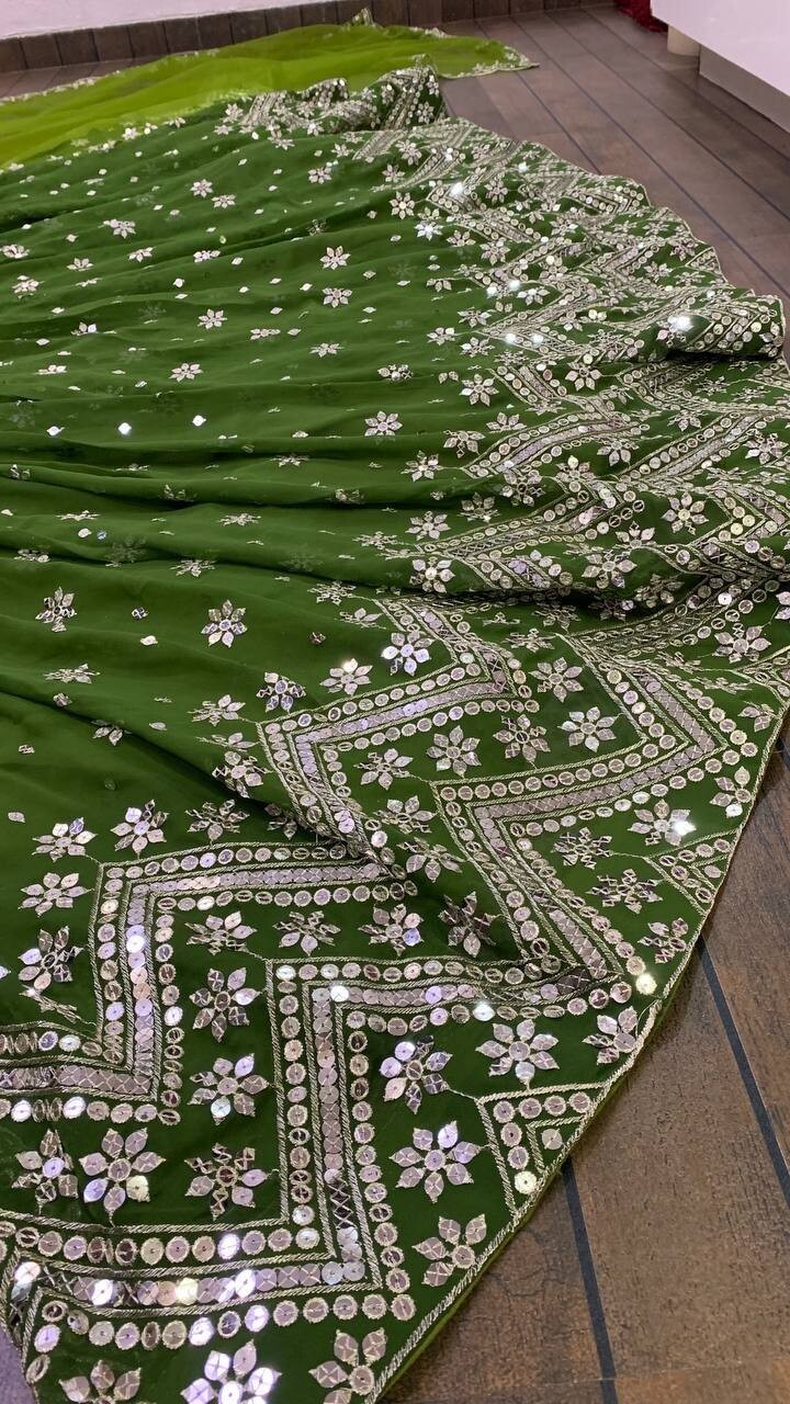 Beautiful Desgner Parrot Green Georgette Lehenga Choli And Dupatta For Function
