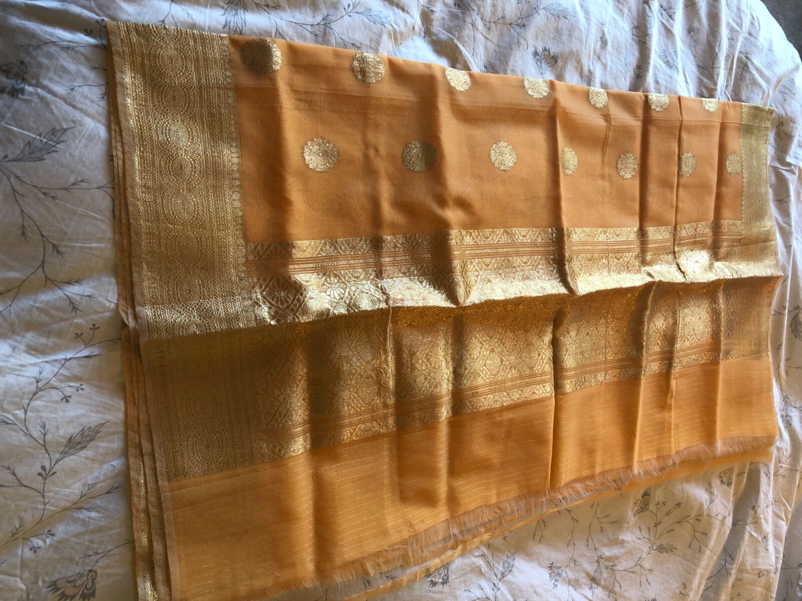 Beautiful and Ornate Peach Gold Organza Sari for weddings, parties