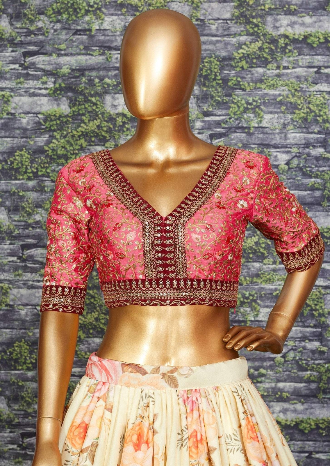 White choli being silk in peach color and is beautifully decorated with sequins,