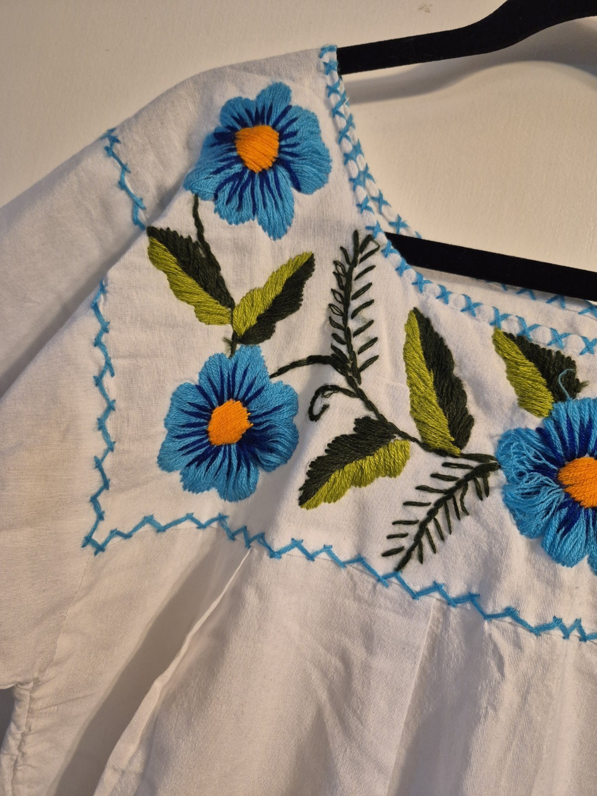 Handmade traditional puebla mexican embroidered White dress with blue floral.c1