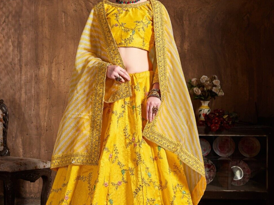 Yellow Color Mulberry Silk Lehenga Choli With Organza Dupatta For Reception Wear