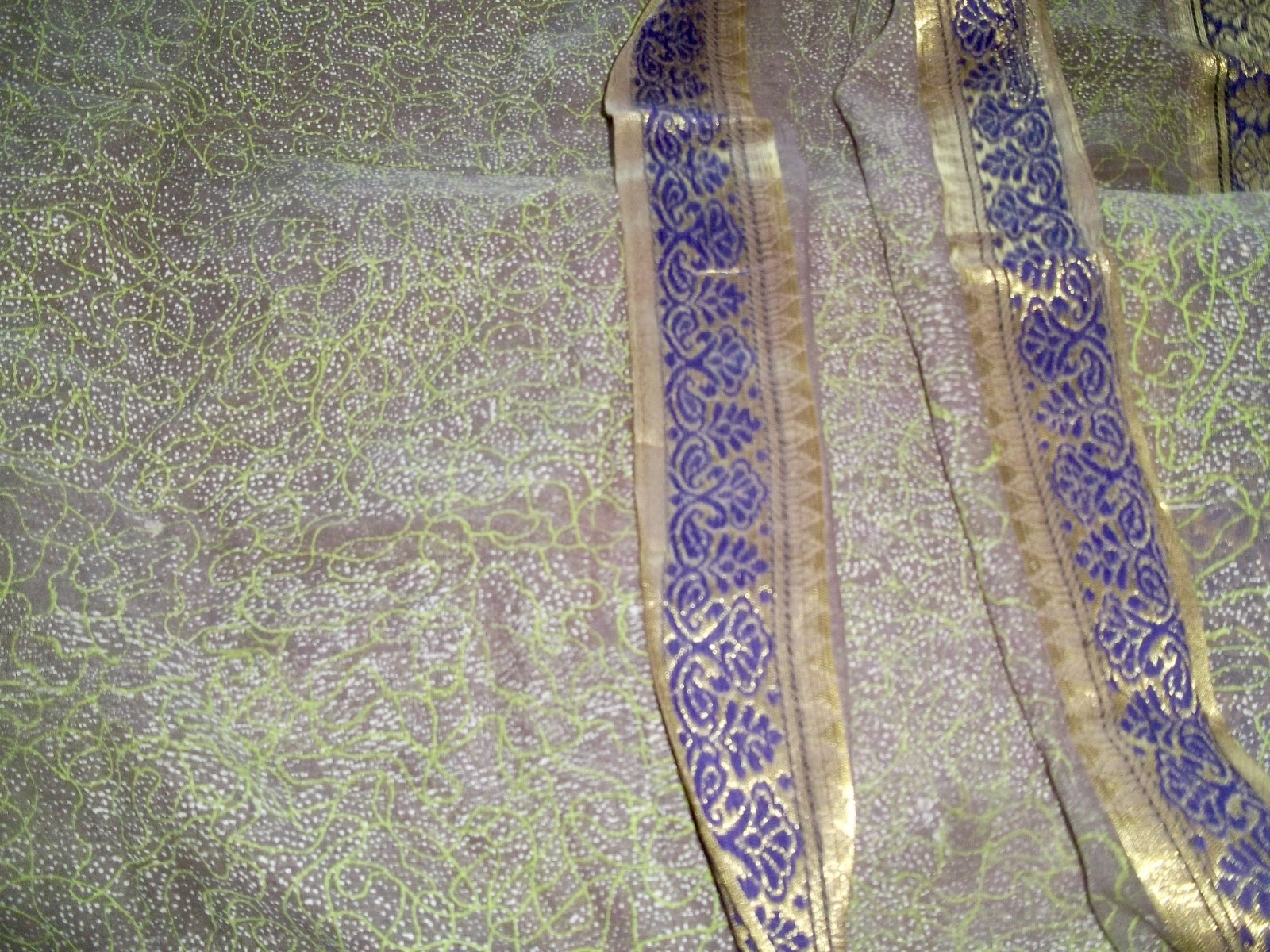 Delicate semi sheer saree • intricate gold weave • purple border • Fabric