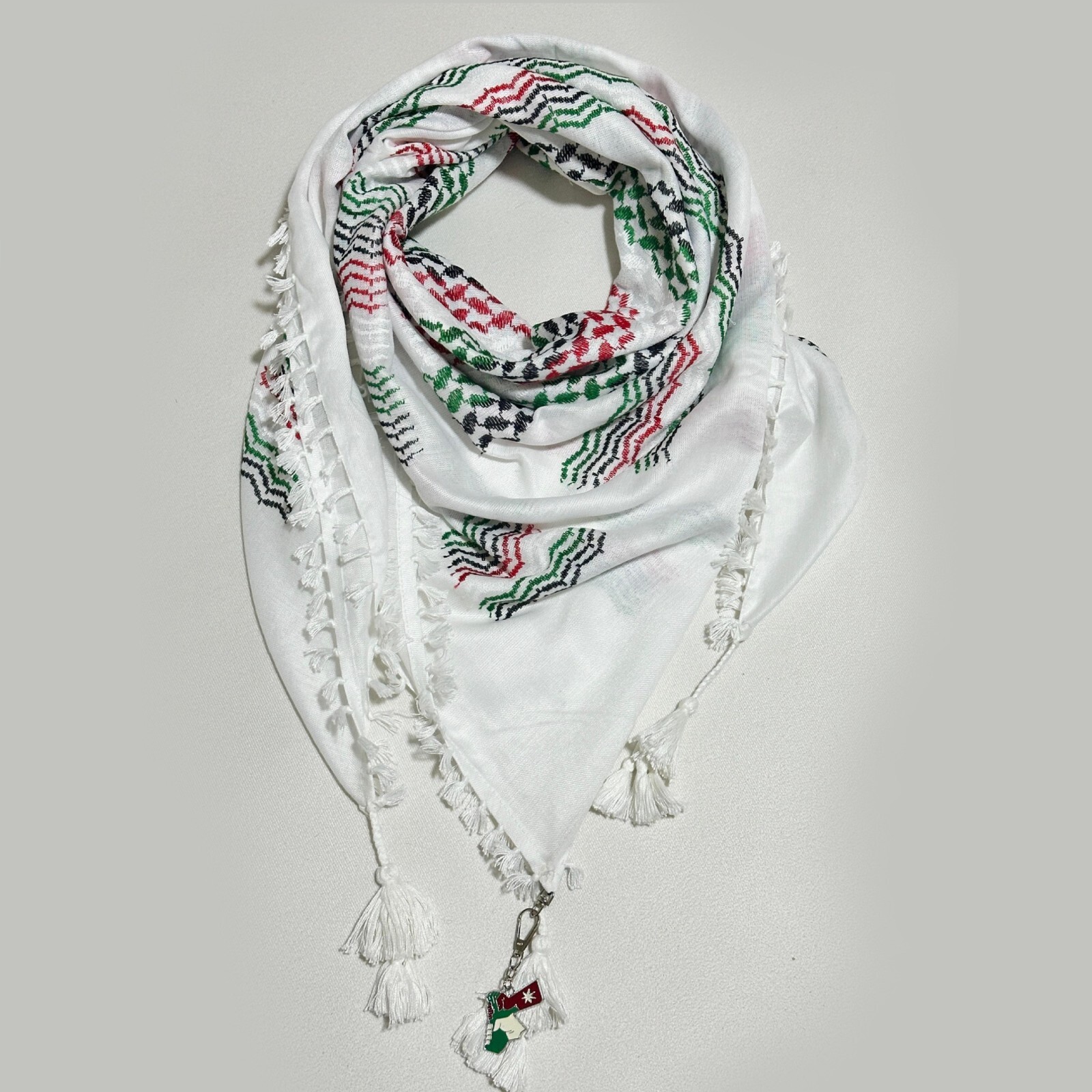 A Palestinian unisex keffiyeh featuring the Palestinian flag colors design.