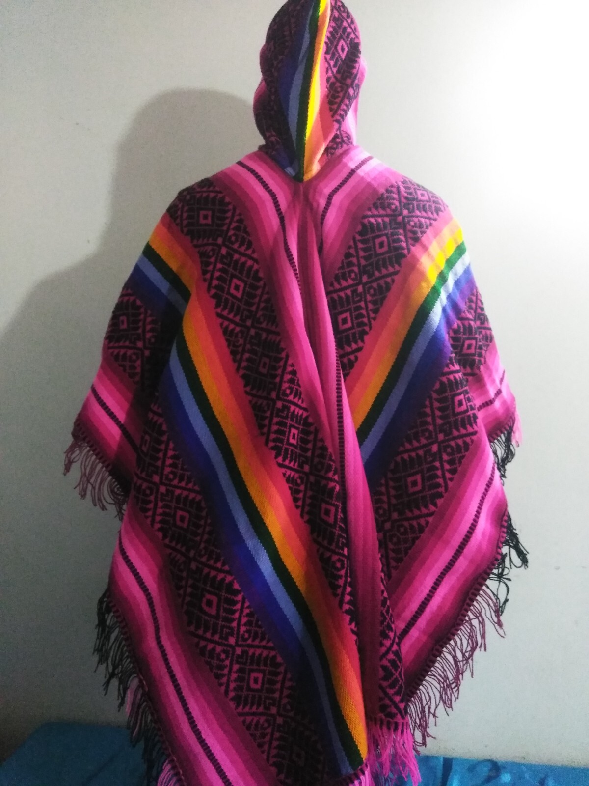 Peruvian poncho with multicolored hat knitted in Andean community wool