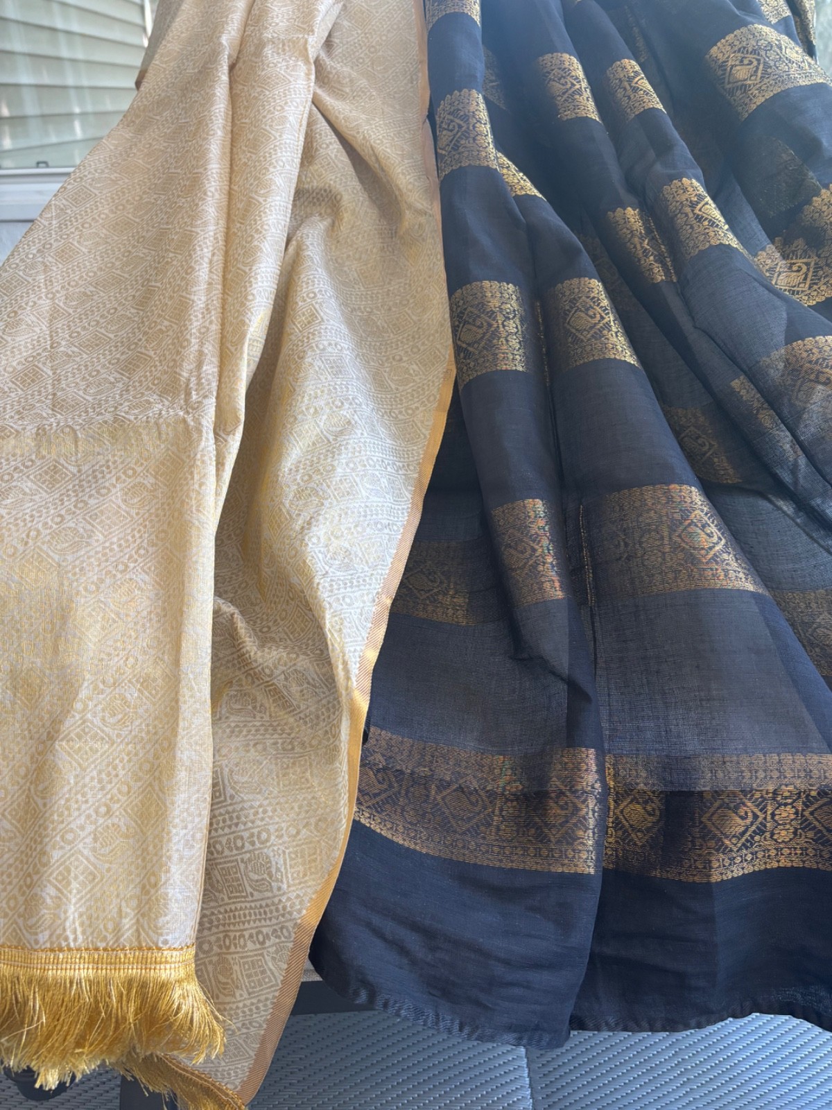 Cream and black cotton saree with zari work with fall and pico.