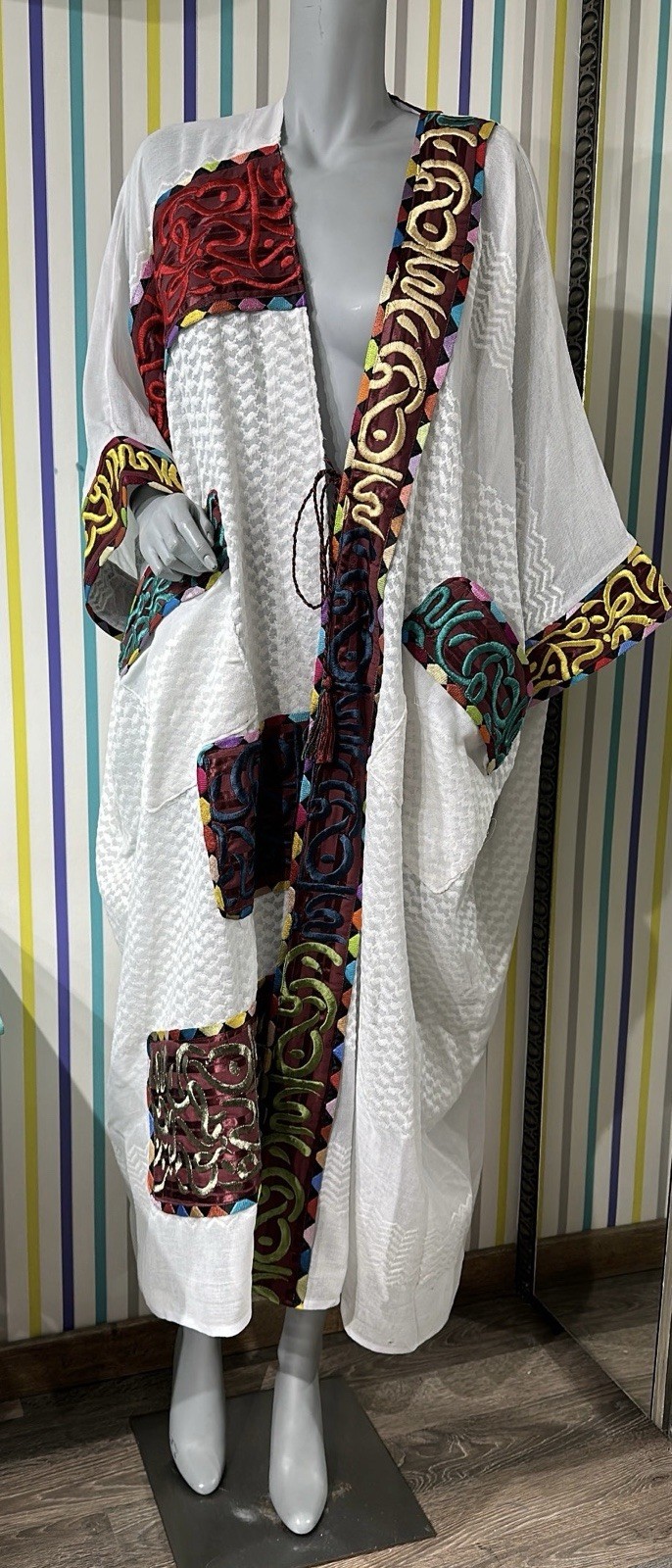 white abaya kaftan colorful embroidered patches and border accent