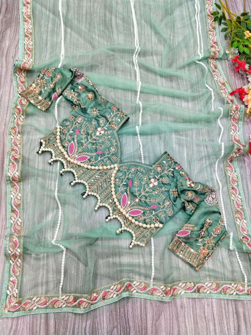Attractive Look Premium Net Saree With Beautiful Blouse For Functional Wear