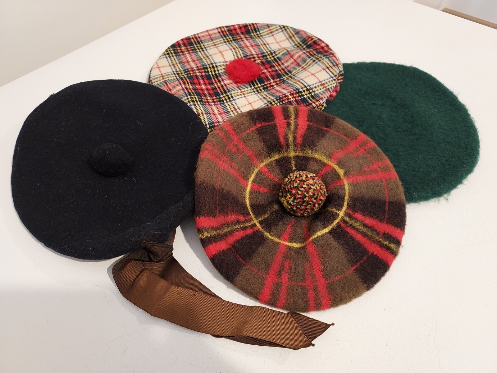 4 vintage woolen TAM O’ SHANTERS, various sizes and styles