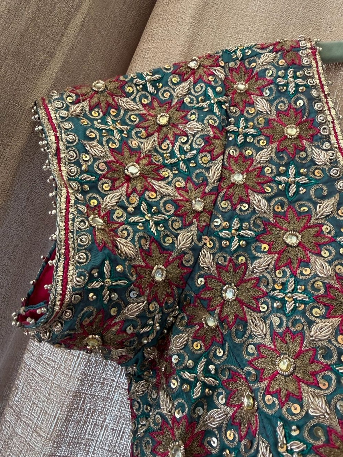 Saree embroidered crop top with floral motif in a gorgeous teal and red