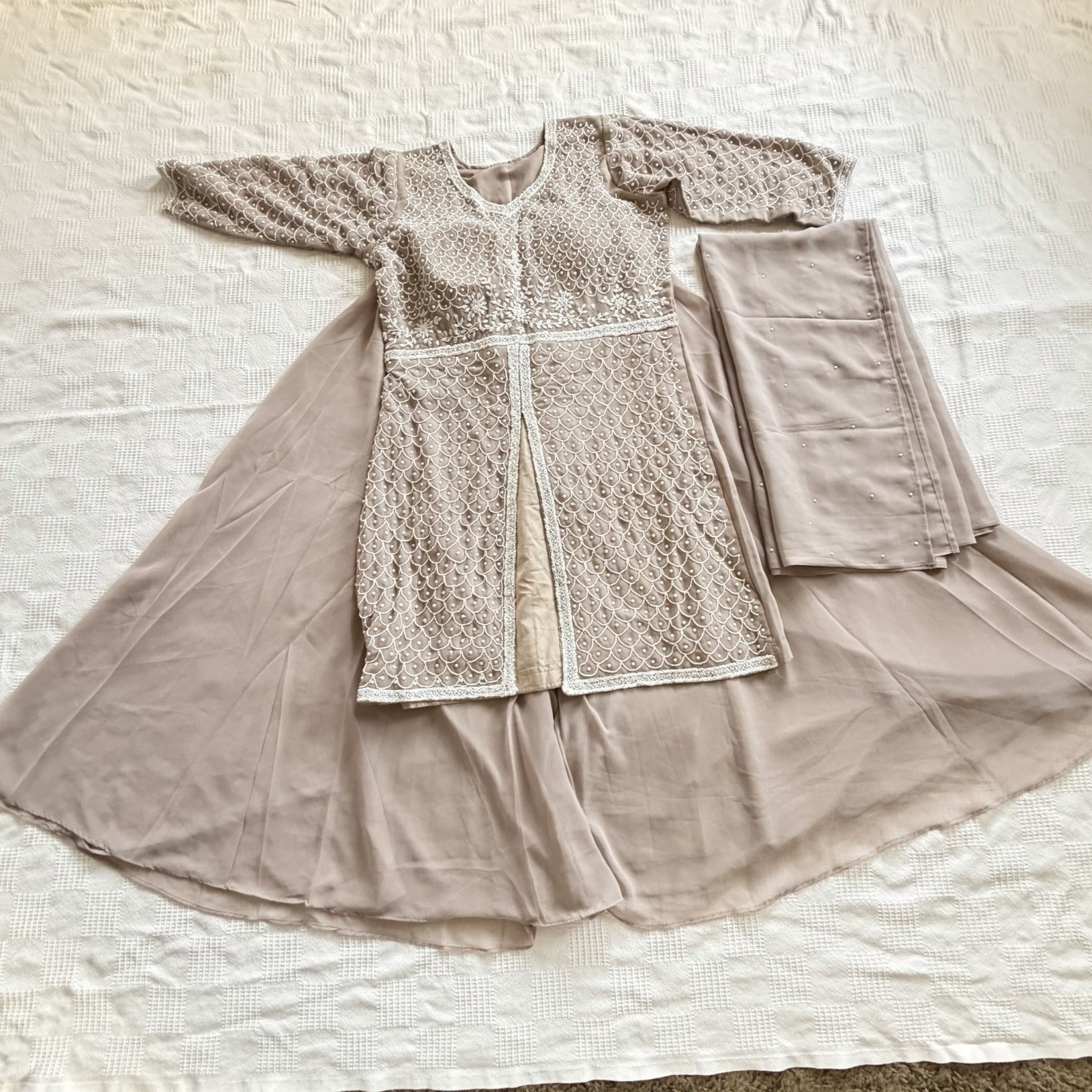Gorget material Beige colour hand work party wear.