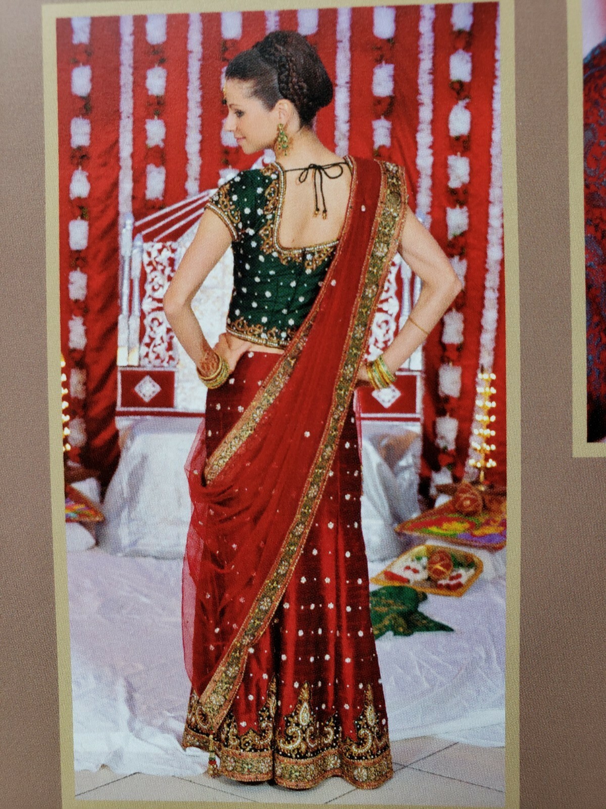 Gorgeous Lehenga Saree – emerald green and deep red, covered in sparkling stones