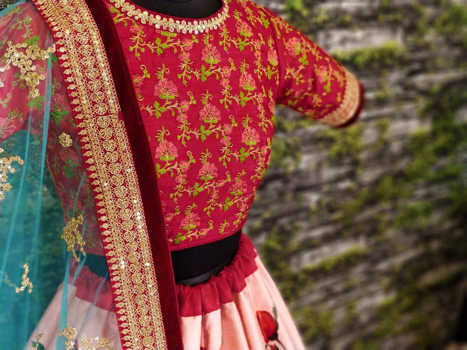 Stunning Giant Rose Florals printed on lehengas with Heavily Embroidered Blouse