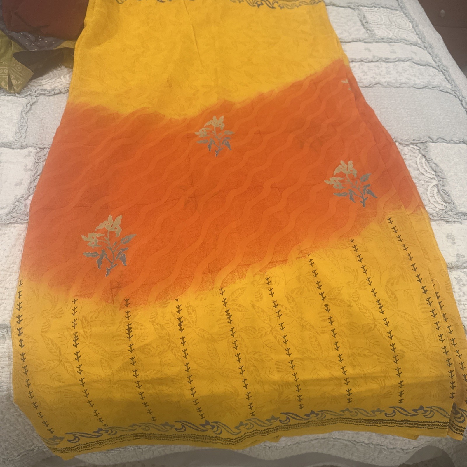 Very pretty Pure Crepe Silk Saree With Orange And Yellow Color And Small Border