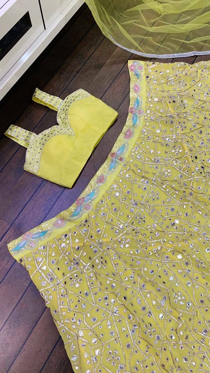 Function Wear Yellow Georgette Lehenga Choli With Net Dupatta For Women